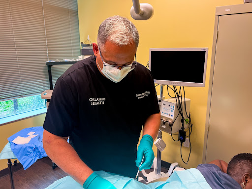 Terrence Peppy, MD, administers a testosterone pellet injection to a patient at Orlando Health. The tiny, time-released pellets provide months of symptom relief for menopausal women, but a new survey by Orlando Health finds few people are aware of this safe and effective treatment option.
